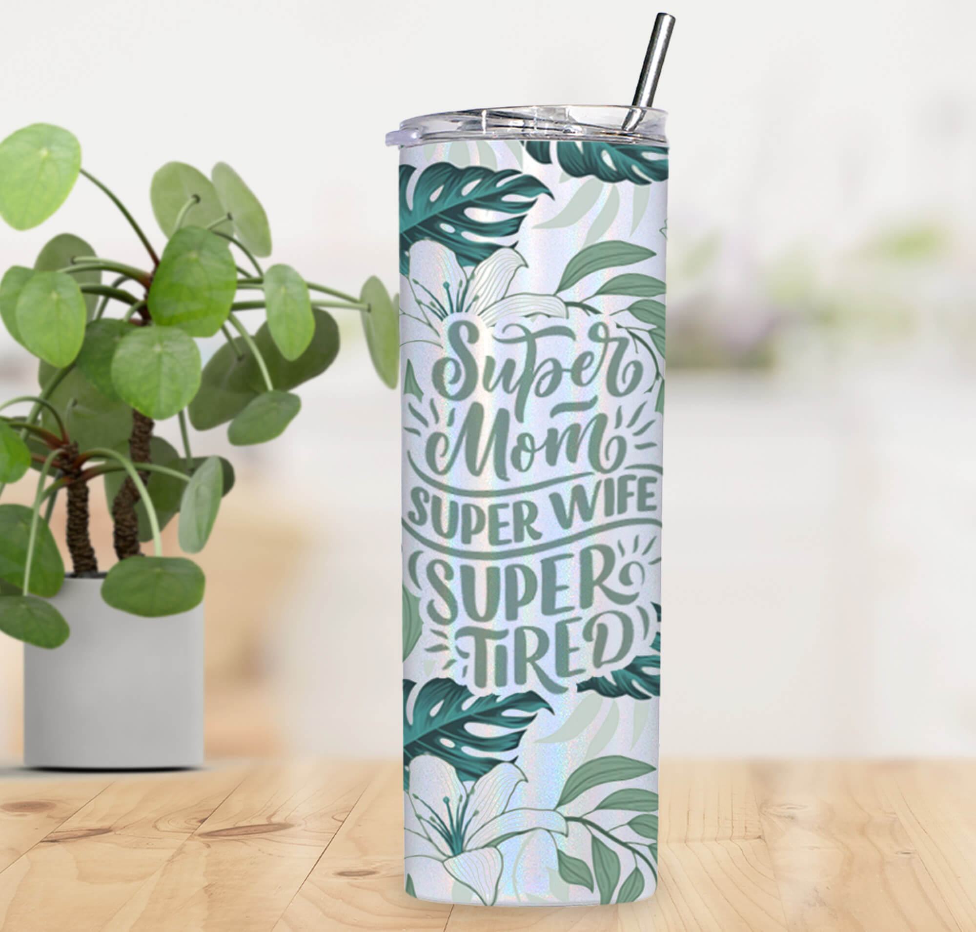 tumbler customized with super mom super wife super tired sitting on a table